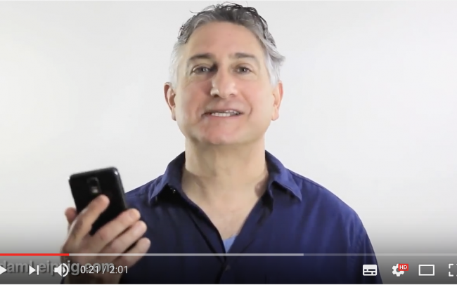 Adam Leipzig holding a phone